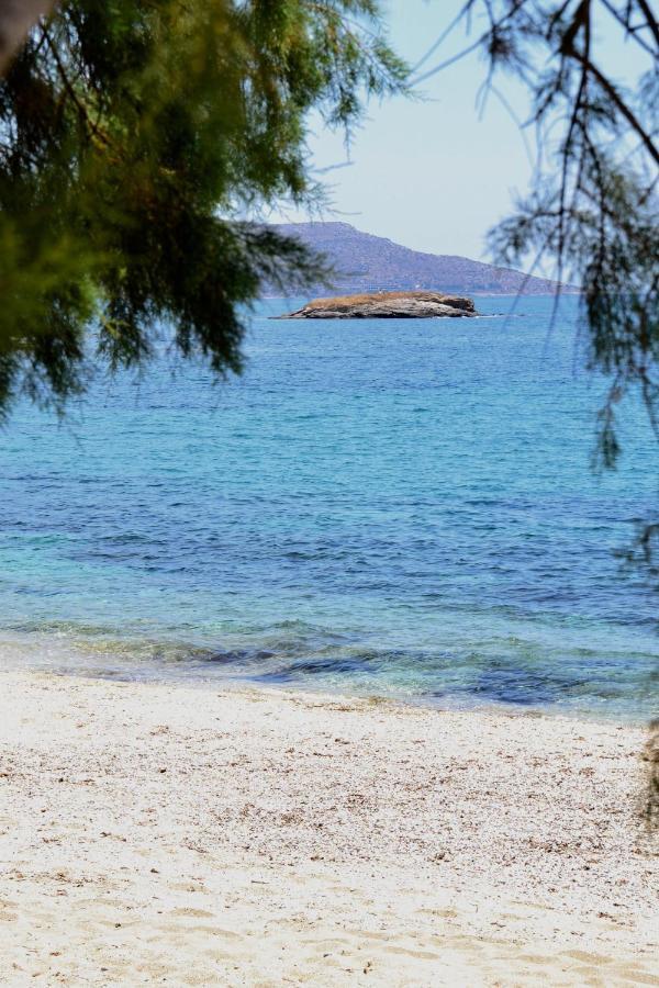 Beach House Set In A Beautiful Bay Каристос Екстериор снимка