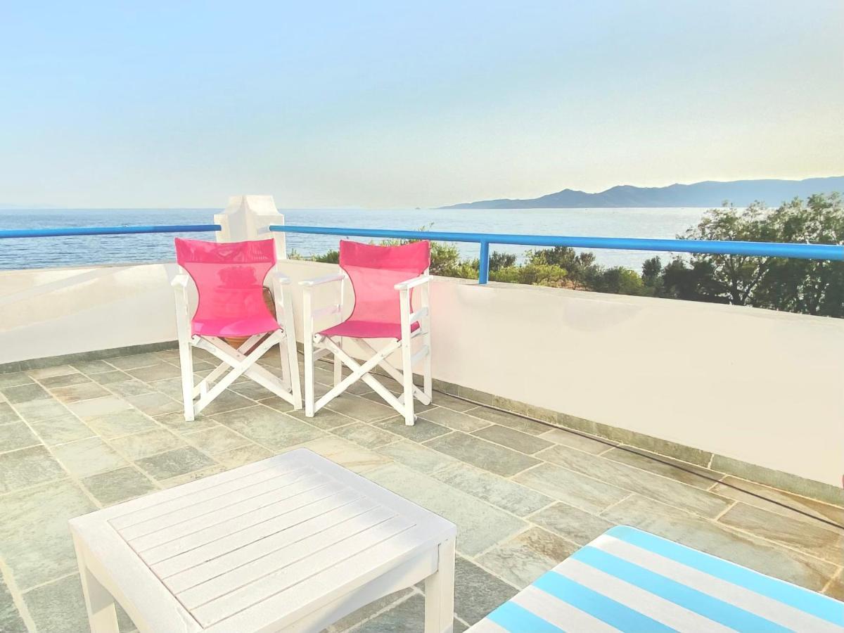 Beach House Set In A Beautiful Bay Каристос Екстериор снимка